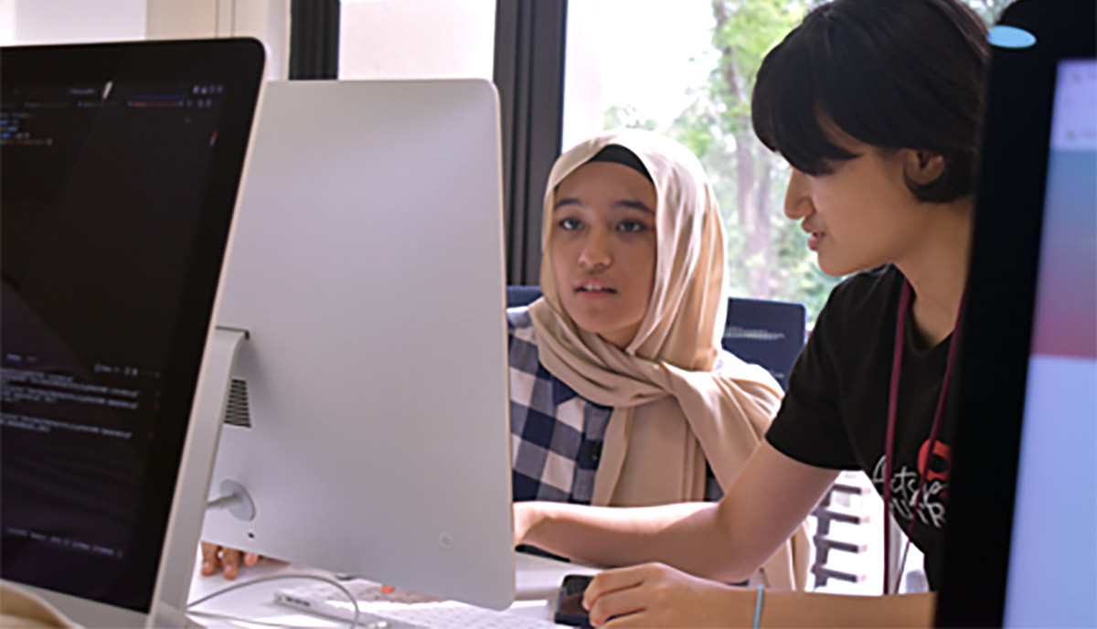 A close-up shot of two students at 42KL