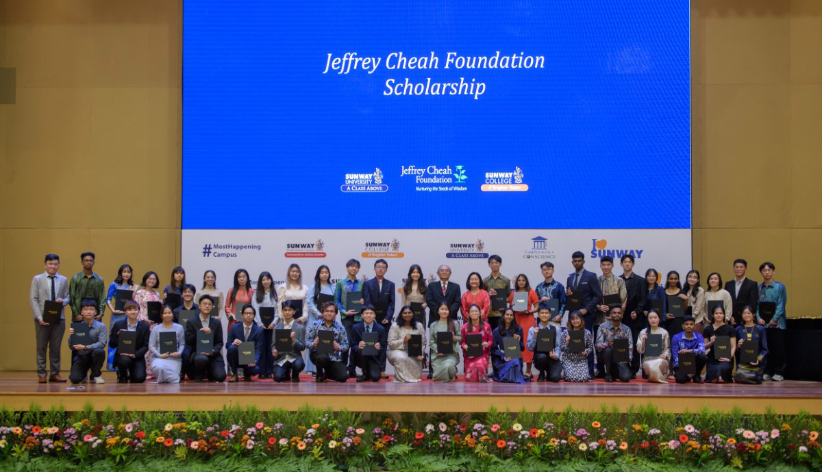 2024 Jeffrey Cheah Foundation (JCF) scholarship recipients on stage at the JCF scholarship award ceremony in Sunway University.