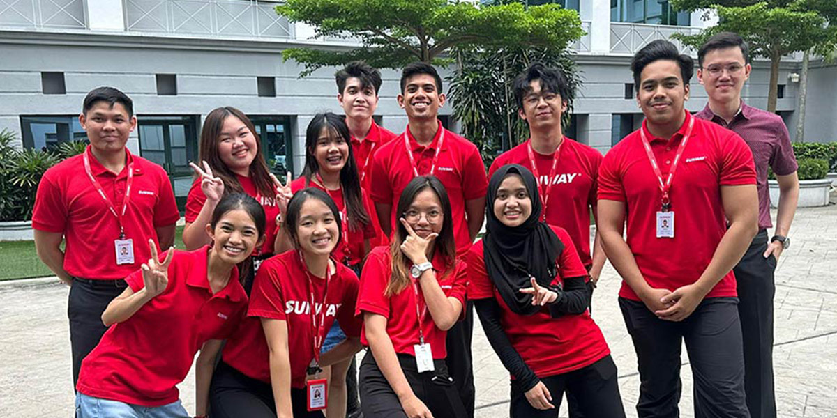 A body shot of Sunway’s Management Associates posing for the camera