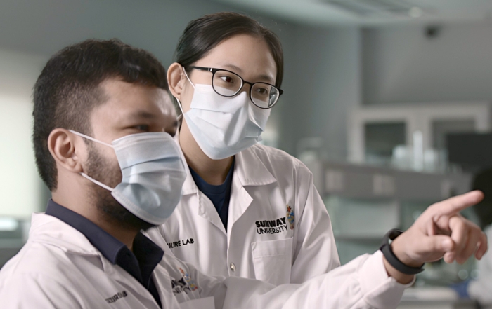 A medium shot of two Sunway University researchers at a lab at Sunway University.