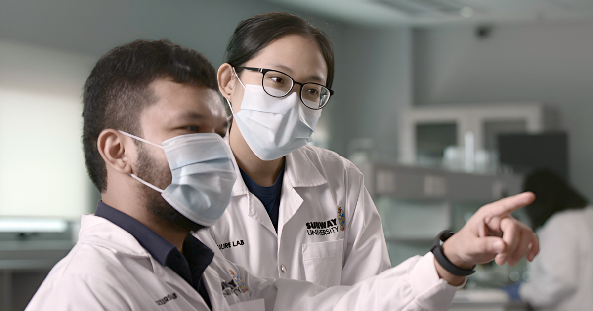 A medium shot of two Sunway University researchers at a lab at Sunway University.